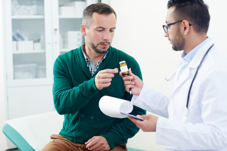 Doctor discussing medication with a patient.